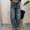 jeans denim con cintura nera