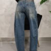 Jeans wide leg con cintura foulard